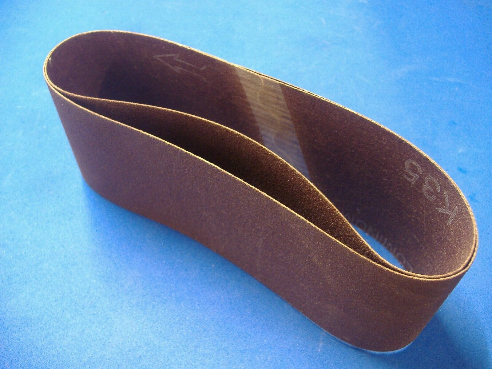 TWO 2 1/2″ X 16″ SANDING BELTS 120 GRIT FINE