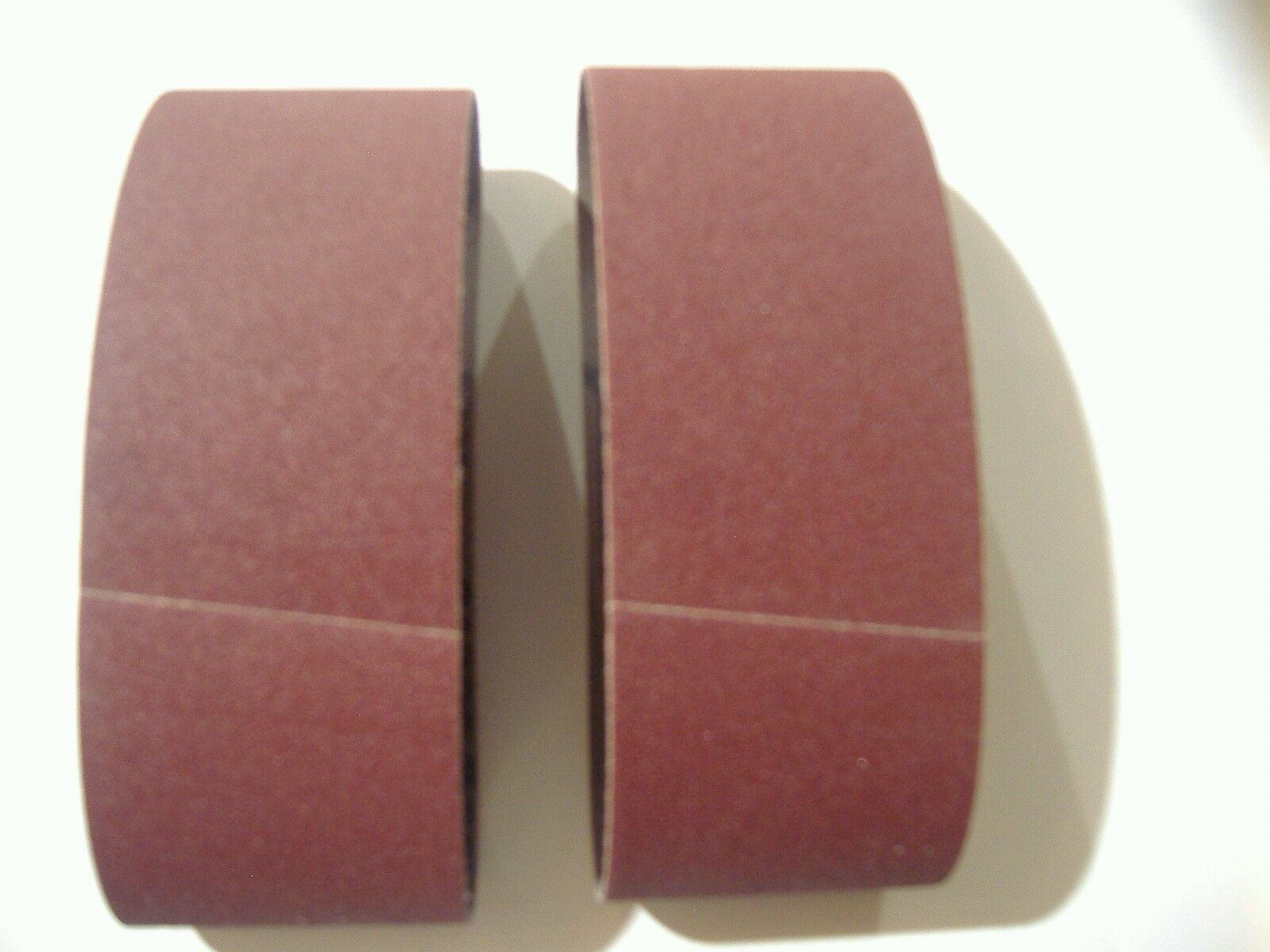TWO 2 1/2″ X 16″ SANDING BELTS 50 GRIT COARSE