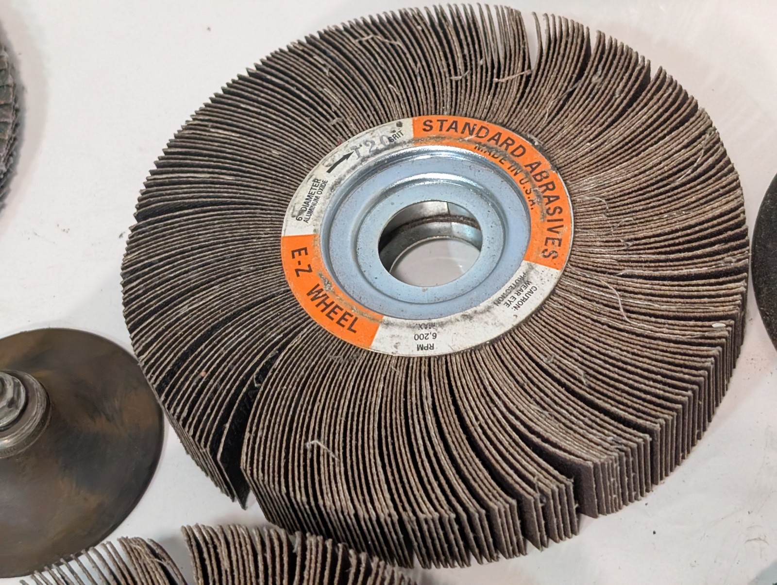 Lot of 70 Assorted Grinding and Sanding Wheels/Belts, Some Used, Most Unused