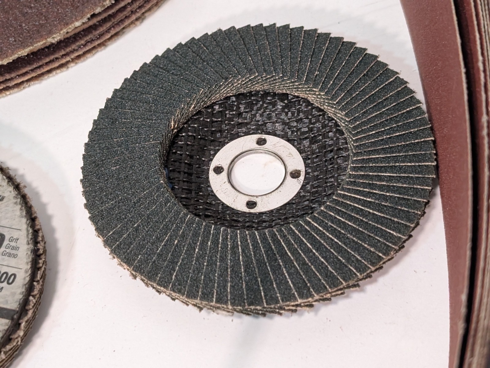 Lot of 70 Assorted Grinding and Sanding Wheels/Belts, Some Used, Most Unused