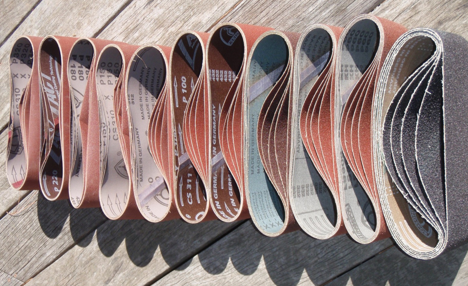 4 X 24 Aluminum Oxide Sanding Belts (lot of 55, various grits)