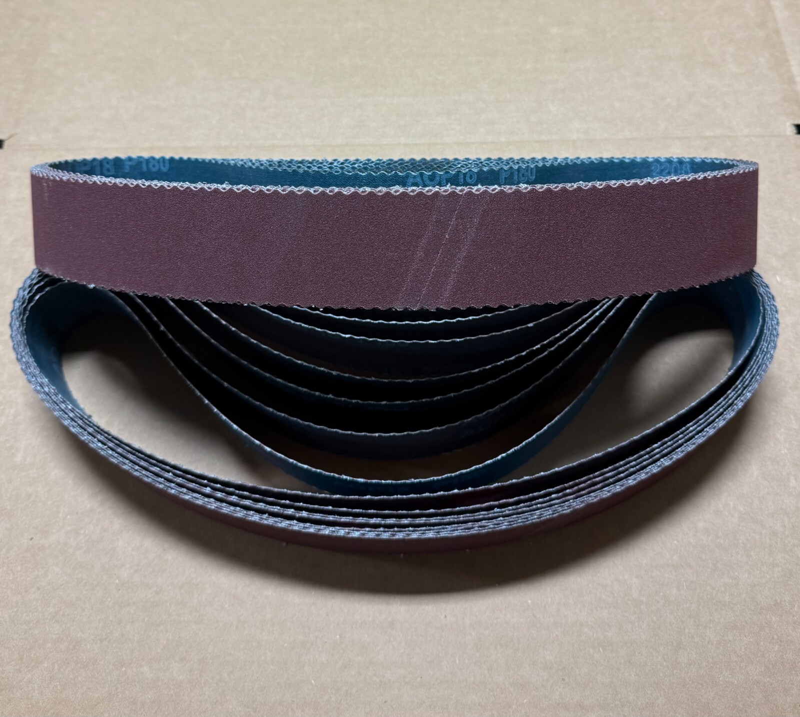 PREMIUM A/O, Y-WEIGHT SCALLOPED EDGE SANDING BELTS, 2″ X 36″, 10- PACK, 180-GRIT