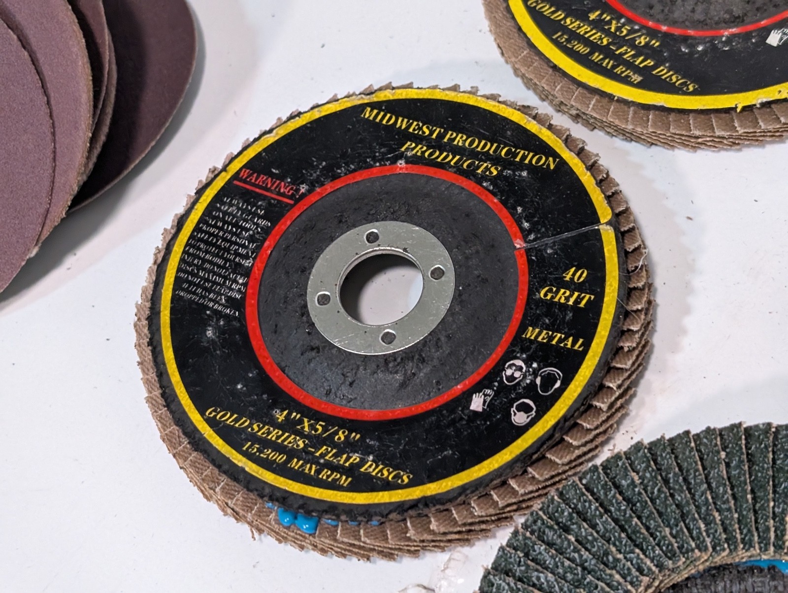 Lot of 70 Assorted Grinding and Sanding Wheels/Belts, Some Used, Most Unused