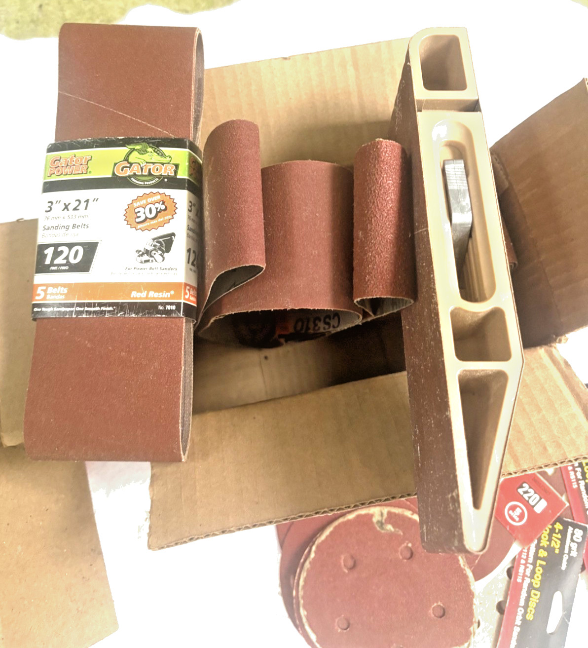 Sanding disks (5 inch & 4.5 inch) and belts (3×21 inch and shorter)