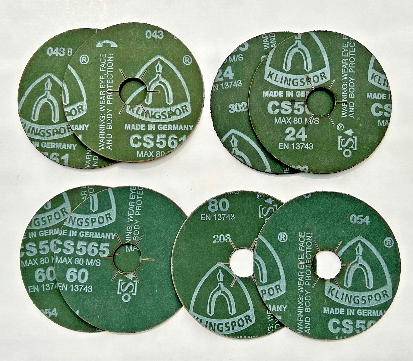 Pack of 8: Klingspor CS565 4-1/2 x 7/8″ Star Hole Fiber Sanding Disc