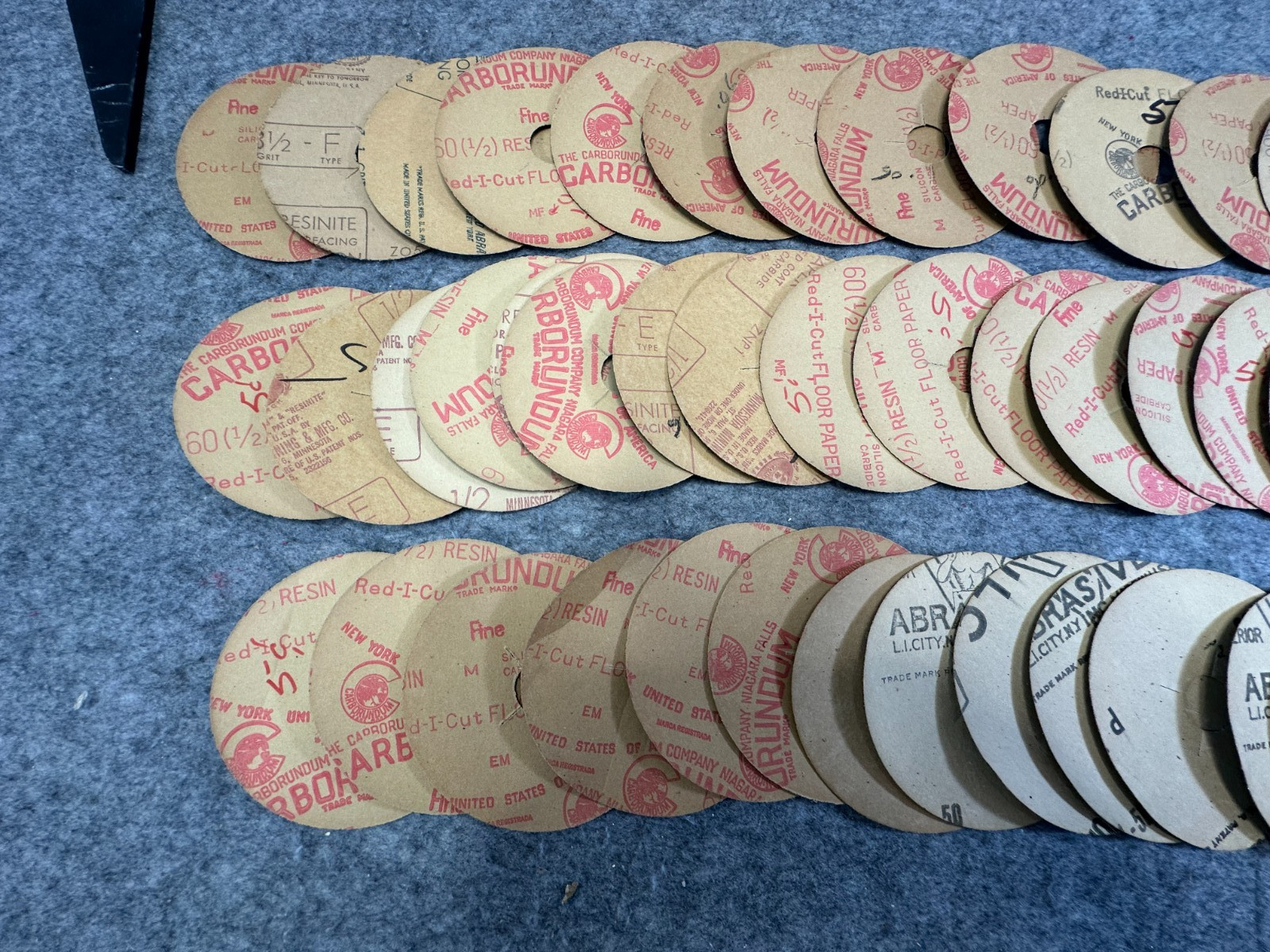 Lot of 58 Sanding Discs 5″ Diameter Carborundum various grits Red-I-Cut USA Made