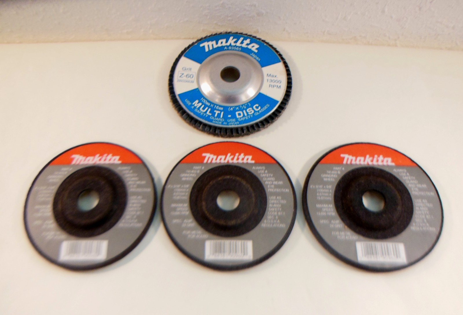3 MAKITA 741402-B Grinding Wheels & 1 MAKITA A-83565 Z-60 Zirconium MULTI-DISC