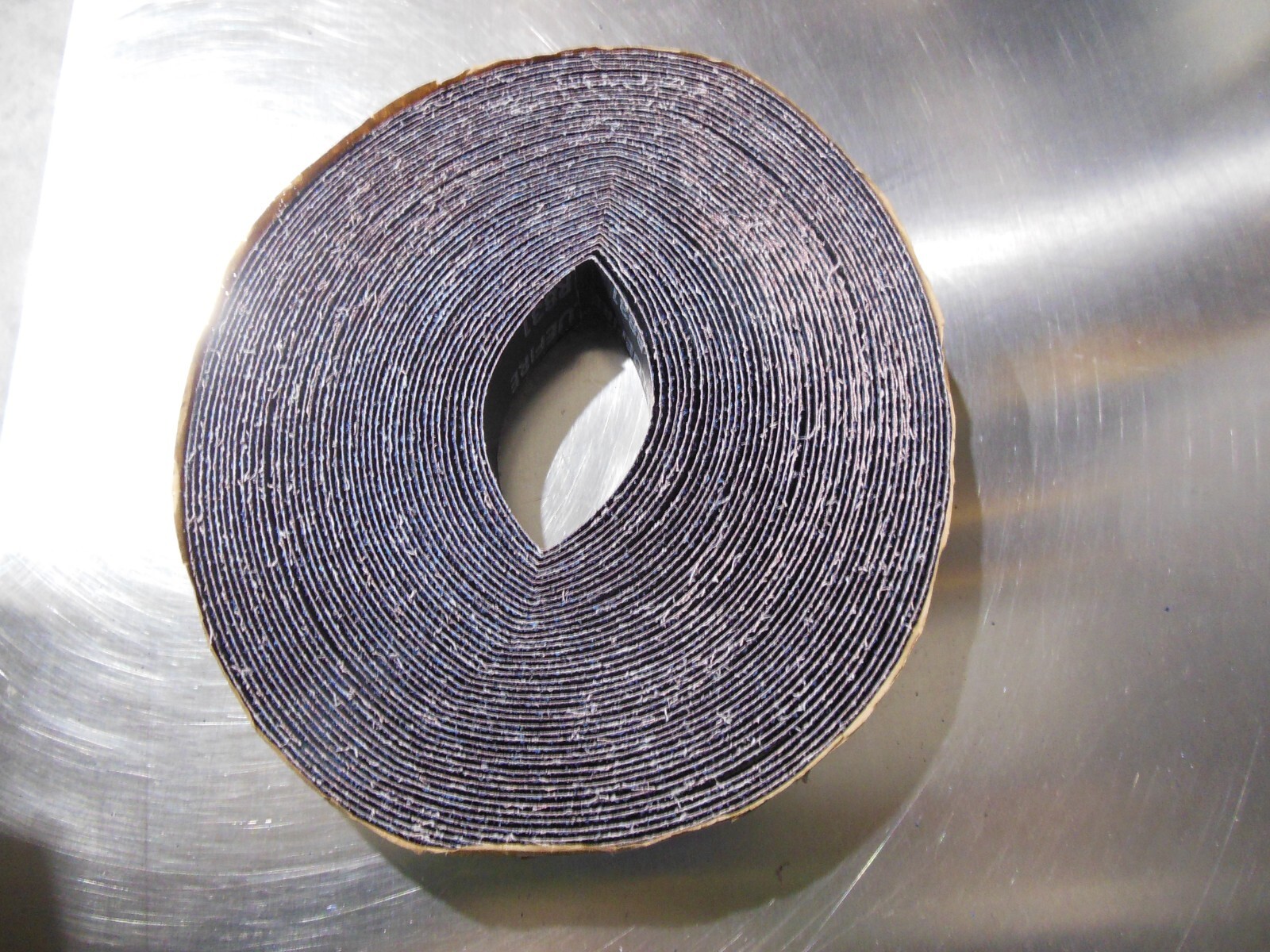 NORTON SAINT GOBAIN R831 BLUEFIRE 1-3/8″ X 25YD GRIT: 24 SANDPAPER ROLL 96672