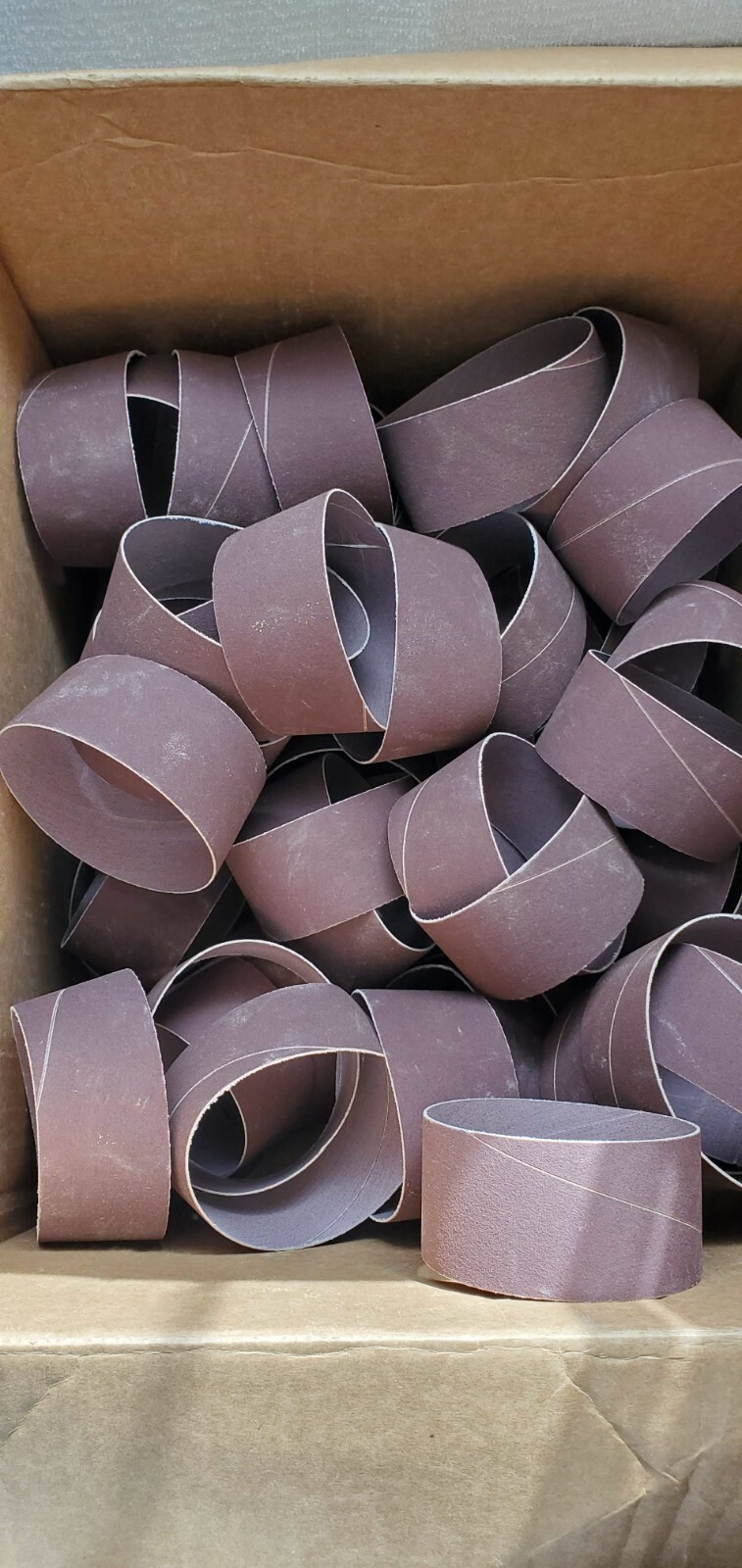 LOT OF 56 – 2″ x 4″ 120 GRIT NO LAP SPIRAL BANDS SPINDLE SANDER SANDING SLEEVES